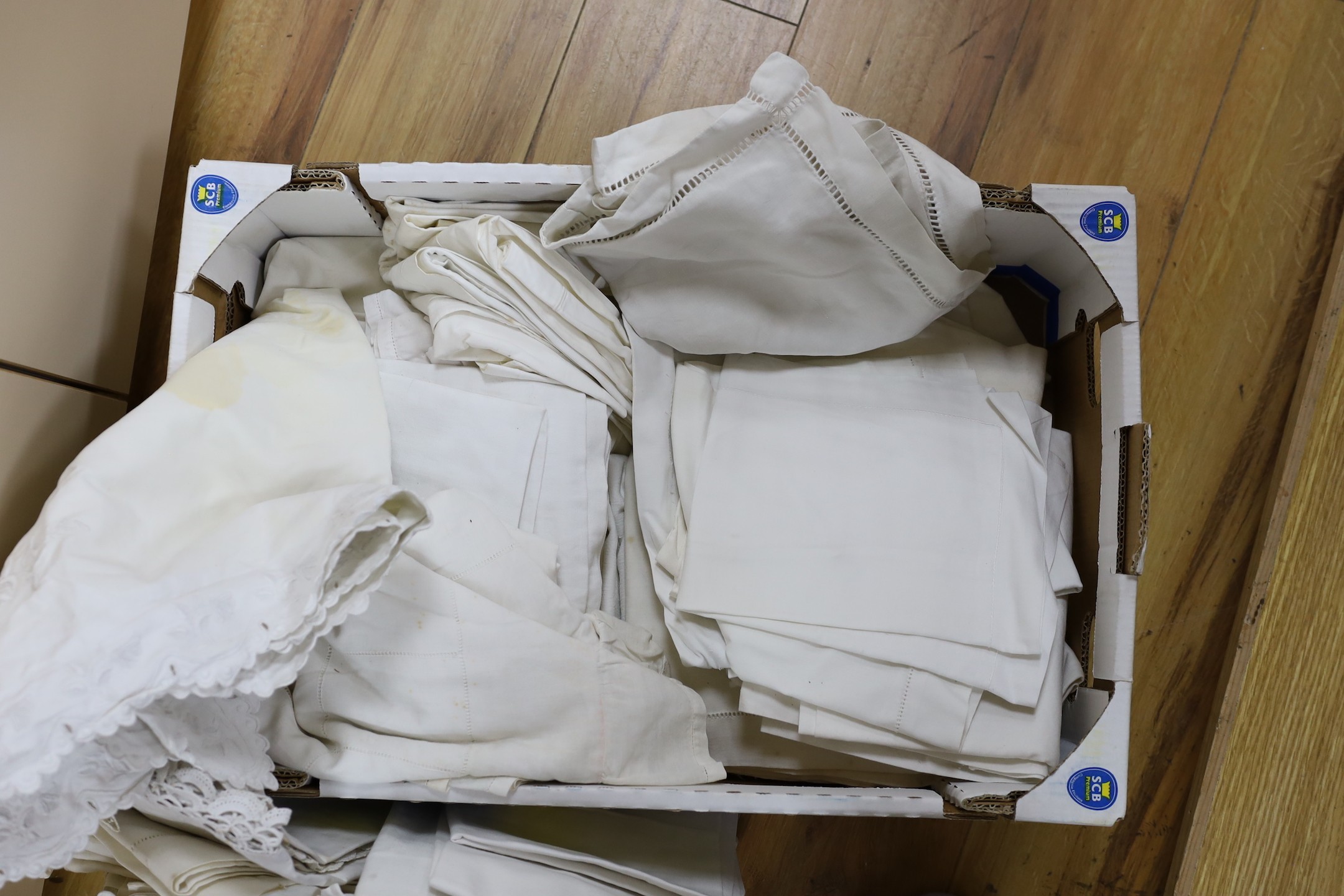 A box of French Provincial linen embroidered pillowcases